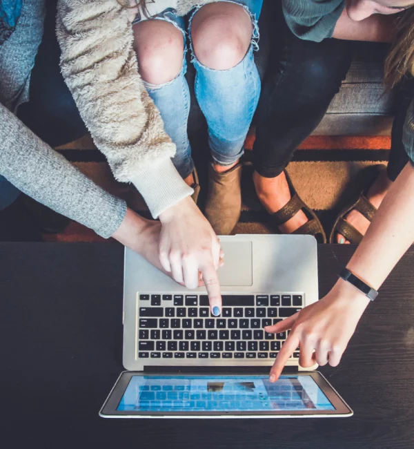 People around a laptop, decorative